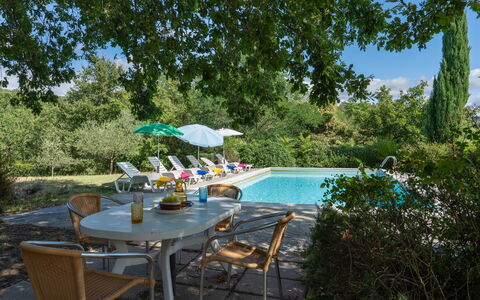 Casa Corella: Vand, Plante, Møbel, Bord, Himmel, Paraply, Svømmepøl, Stol, Udendørs Møbler, Træ