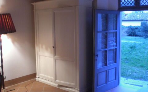 The room opens directly on the villa's garden