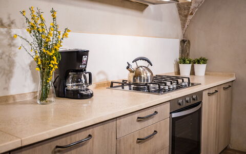 Appartamento La Corte: Cabinetry, Countertop, Plante, Ejendom, Køkkenvask, Køkken, Tap, Håndvask, Indretning, Bygning