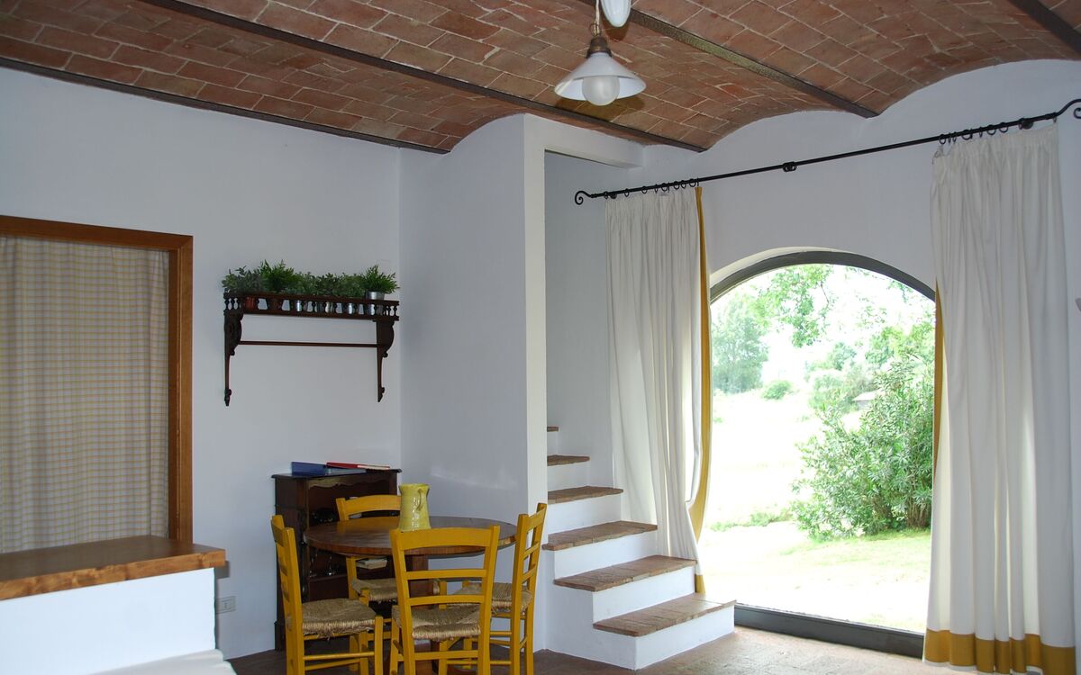 agriturismo-cabbiavoli-chianti-multiproperty-fienile-arancione-pero-living-room