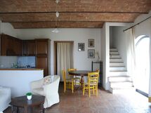 agriturismo-cabbiavoli-chianti-multiproperty-fienile-arancione-pero-living-room