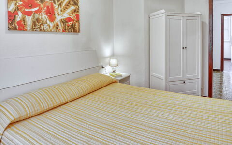 Nina Home - Levanto: Møbel, Ejendom, Komfort, Dør, Bygning, Træ, Textile, Orange, Skygge, Indretning