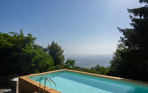 Casa Serra: Vand, Himmel, Plante, Azure, Svømmepøl, Bygning, Træ, Skygge, Hus, Naturlige Landskab