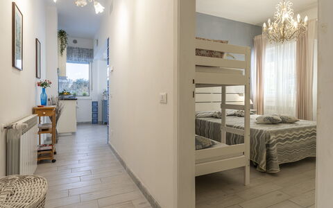 Casa Liliana Ac, Wifi, Forte Dei Marmi: Indretning, Gulvbelægning, Møbel, Etage, Soveværelse, Seng, Træ, Værelse, Loft, Textile