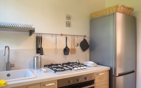 Casa Carla: Køkken Apparat, Køkken, Countertop, Større Bandage, Komfur, Komfur, Husholdningsapparat, Gaskomfur, Cabinetry, Møbel