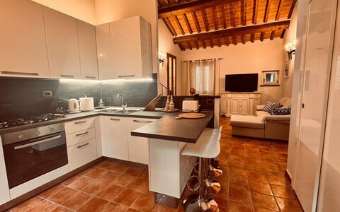 Casa Castelli: Møbel, Indretning, Gulvbelægning, Countertop, Træ, Køkken, Etage, Loft, Cabinetry, Køkken Apparat