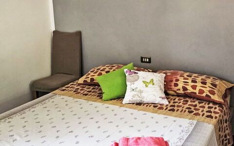 Casa Lulù: Møbel, Seng, Soveværelse, Sengetøj, Sengetøj, Indretning, Sengetøj, Etage, Værelse, Textile