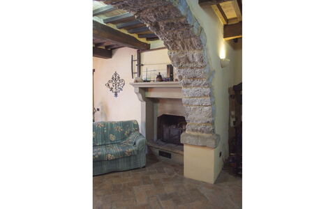 Casa la Primula: Væg, Stenmur, Naturmateriale, Stue, Hearth, Mursten, Ildsted, Stueplante, Hårdttræ, Flise