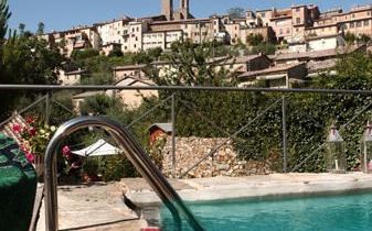 Swimming pool with a view of Montalcino