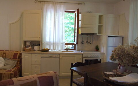 Villa La Quercia: Værelse, Møbel, Ejendom, Indretning, Bygning, Etage, Hus, Bord, Køkken, Stue